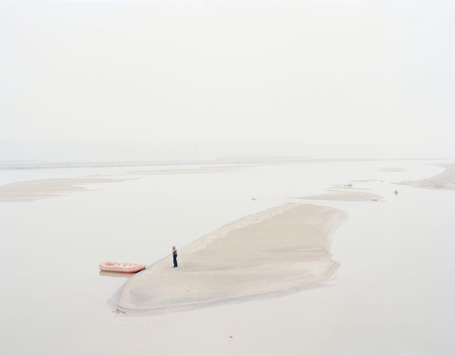 A Man Standing on an Island in the Middle of, 2012